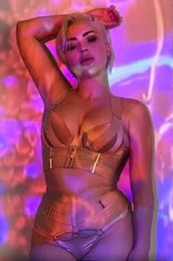 blonde bombshell marilyn monroe type lingerie waitress in retro underwear at a surfers paradise nightclub