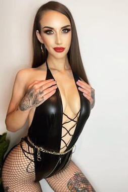 extremely sexy topless waitress wearing skimpy pvc swimsuit and fishnet stockings in sydney's kingsford